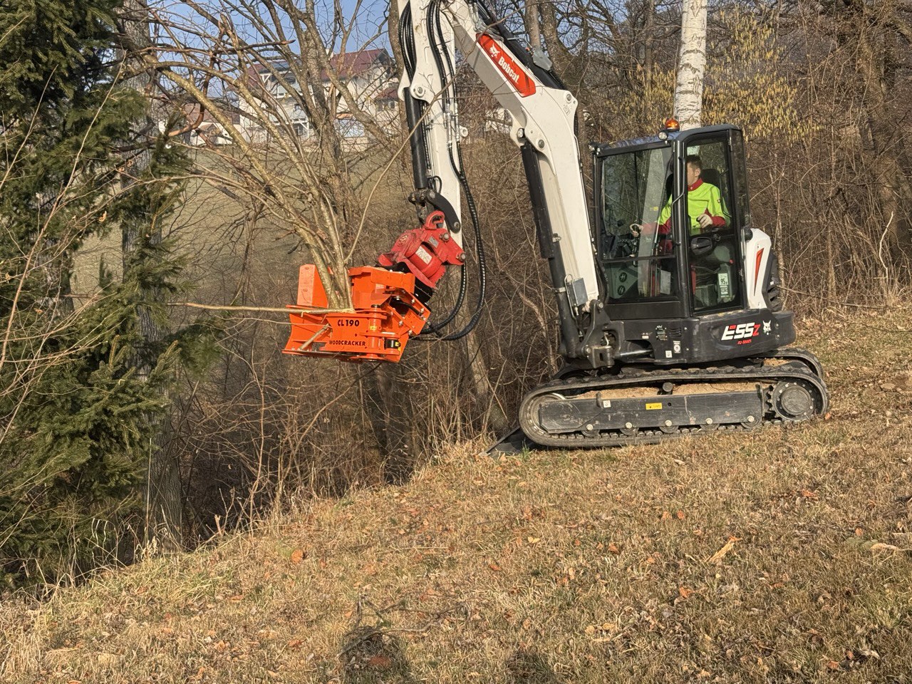 Bagger mit Fällgreifer